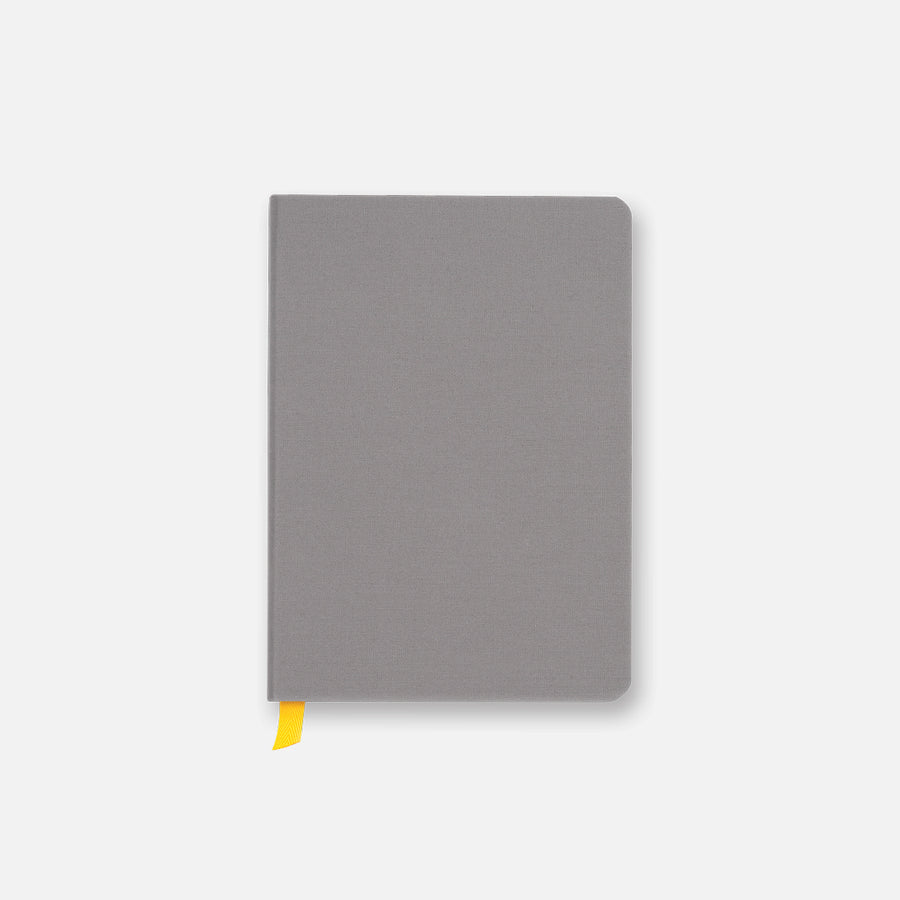 Charcoal gray Confidant Hardcover Notebook with yellow ribbon.