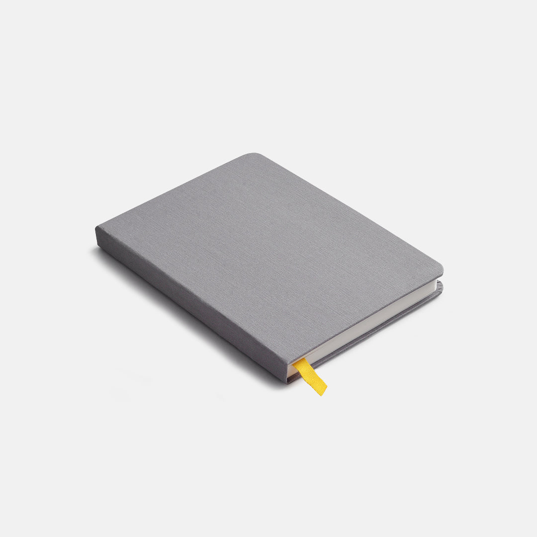Side view of Confidant hardcover notebook.