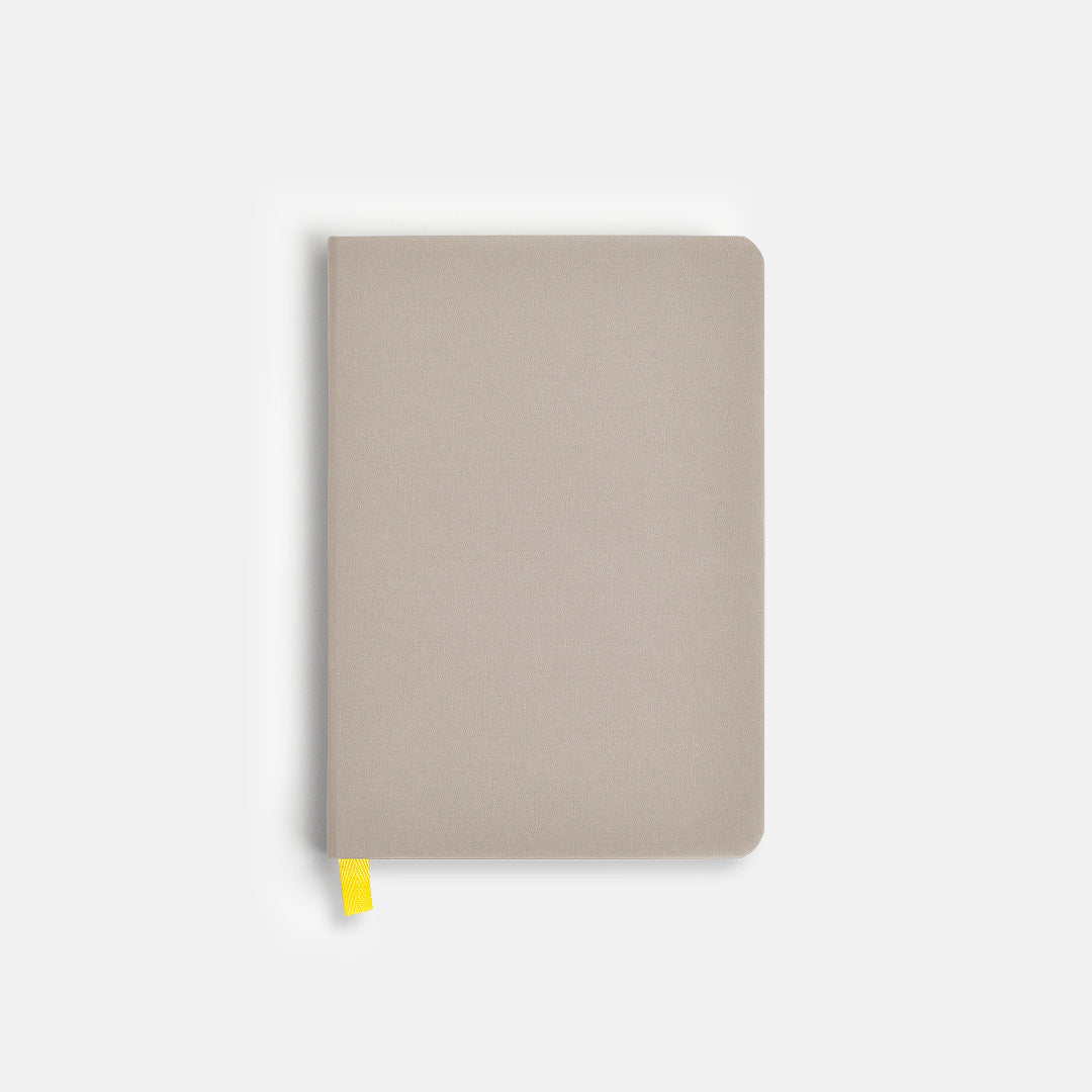 Stone Confidant Hardcover Notebook with yellow ribbon.