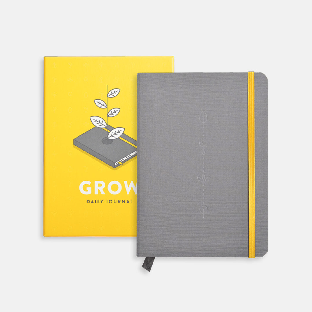 Grow daily journal in charcoal color, with yellow band