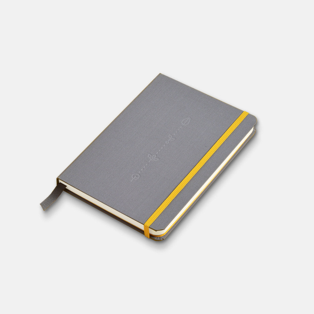 Grow daily journal in charcoal color, with yellow band